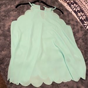 Mint green tank top with a scalloped edge